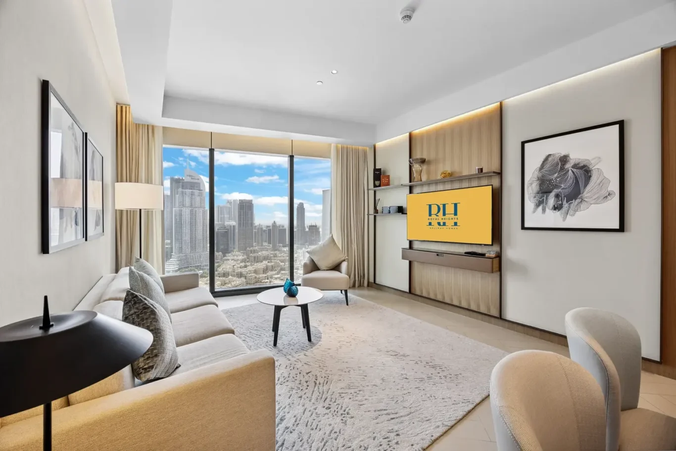 Modern living room with a beige sofa and large windows overlooking a city skyline flourish.