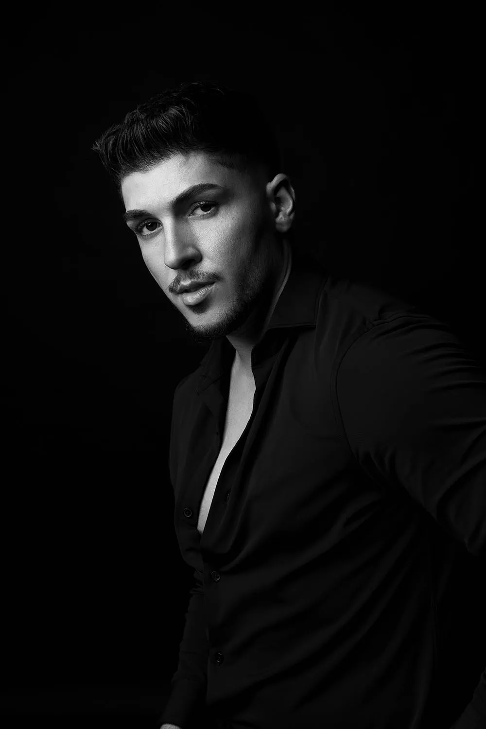 Casting-ready male model headshot with studio lighting — Dubai modeling portfolio