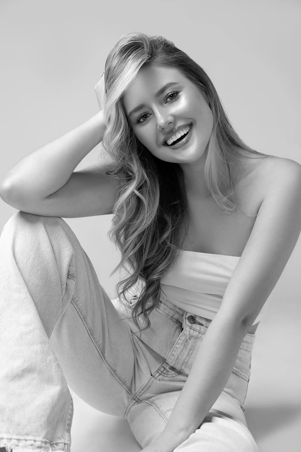 Classic black and white portrait of a woman captured at a professional photo studio in Dubai