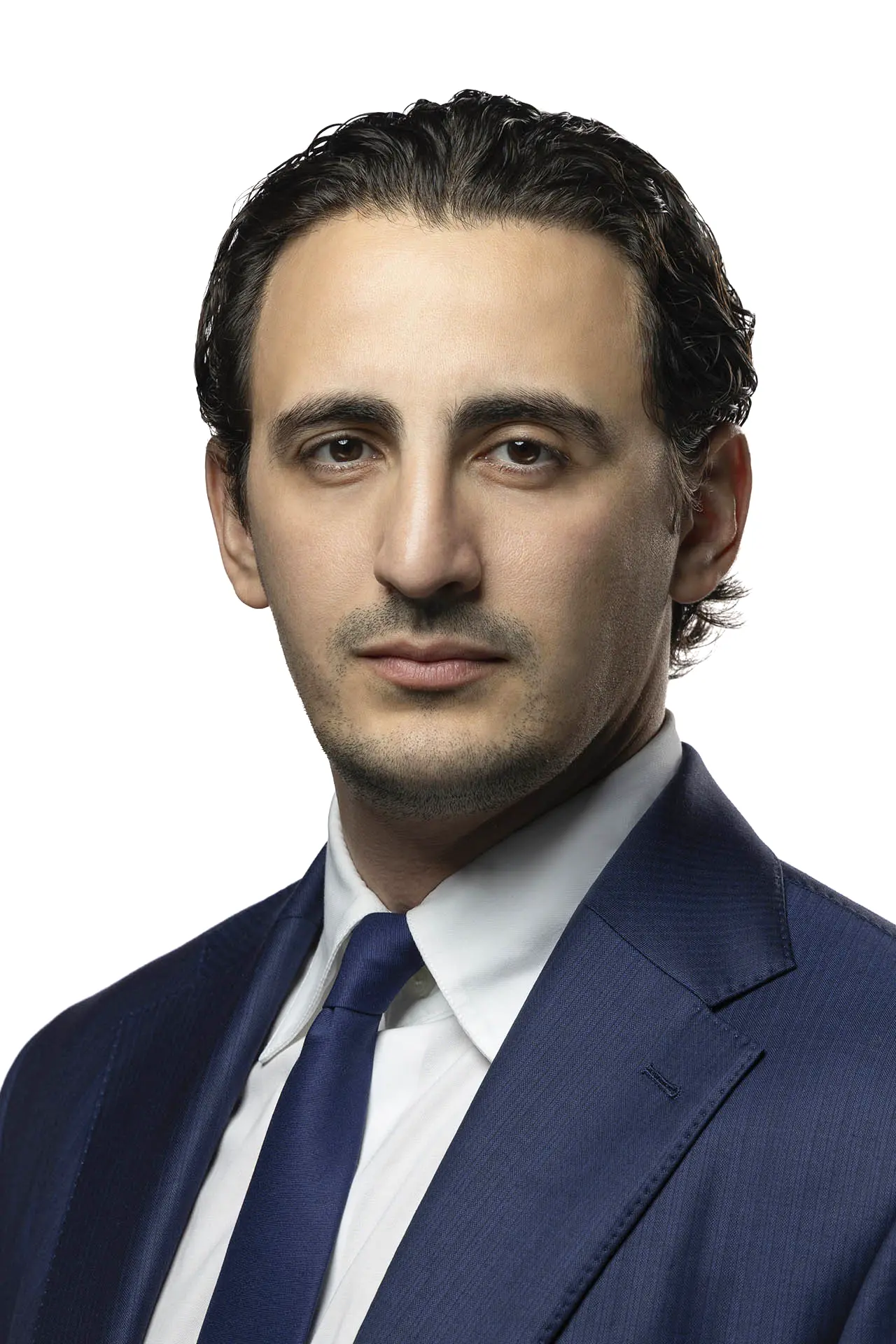 Professional male headshot taken at a photo studio in Dubai