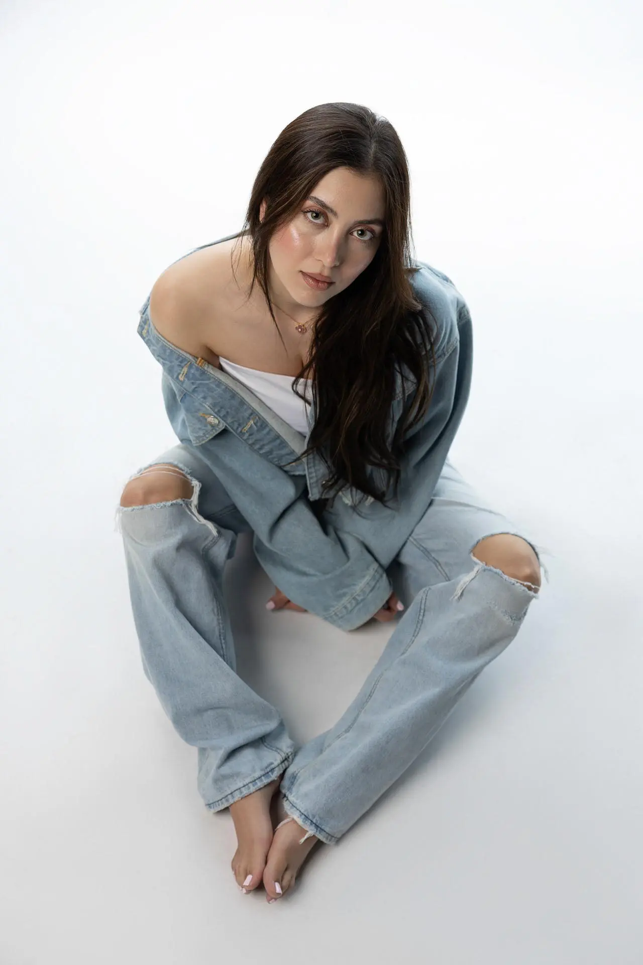 Professional portrait photoshoot of a woman at Masoud Raoufi Photography Studio in Dubai