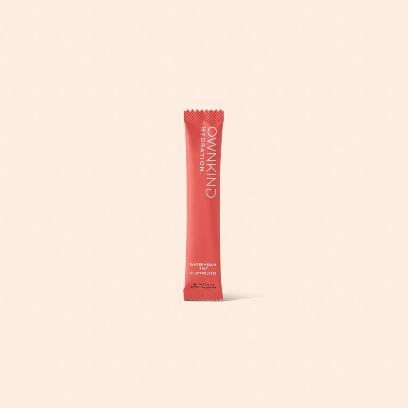 Red single-serving hydration powder packet floating midair against a pale peach background; visible text reads 'Watermelon Salt Electrolytes' at the bottom of the packet.