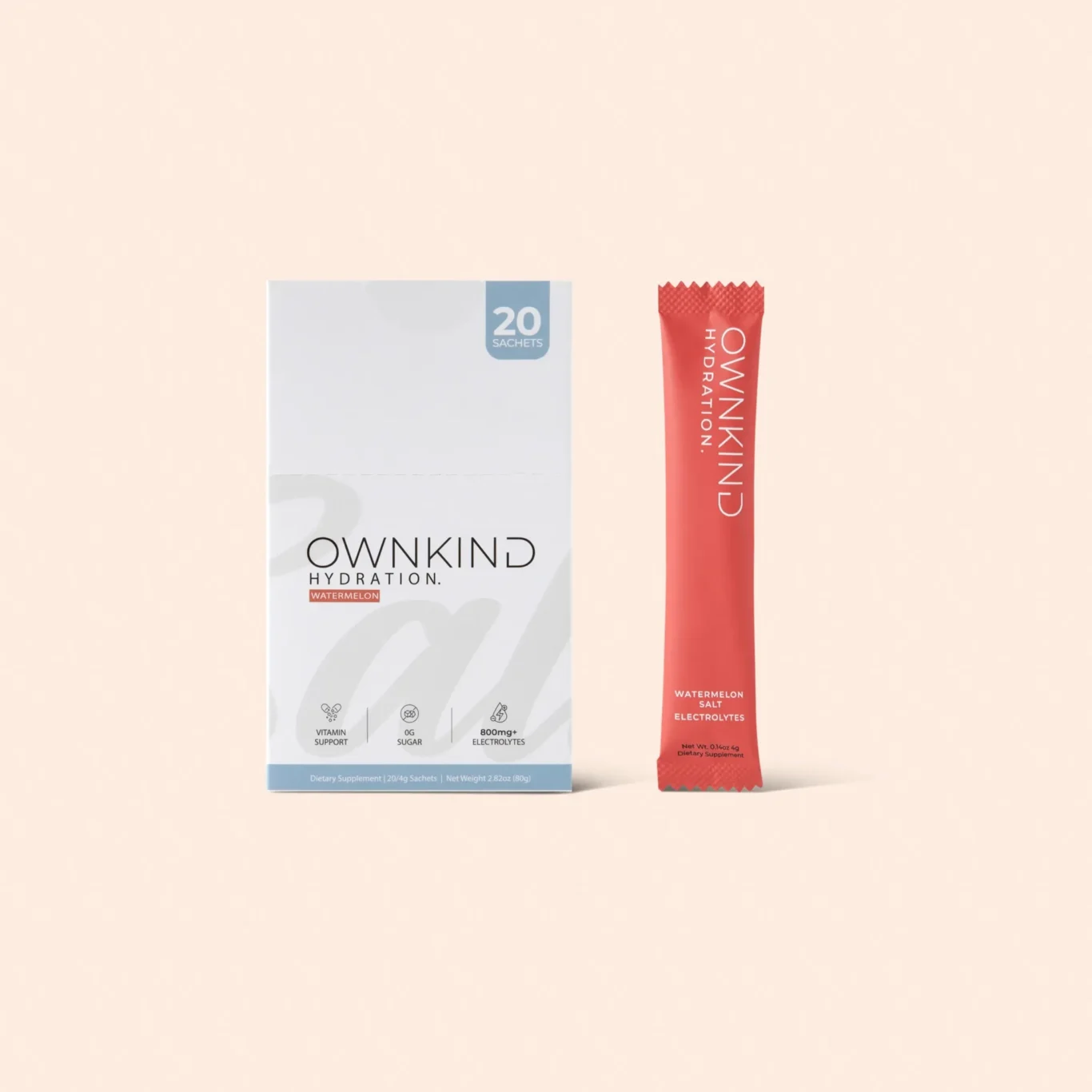 Box of OWNKIND Hydration packets showing '20 SACHETS' label and watermelon flavor, next to a red sachet reading OWNKIND Hydration.