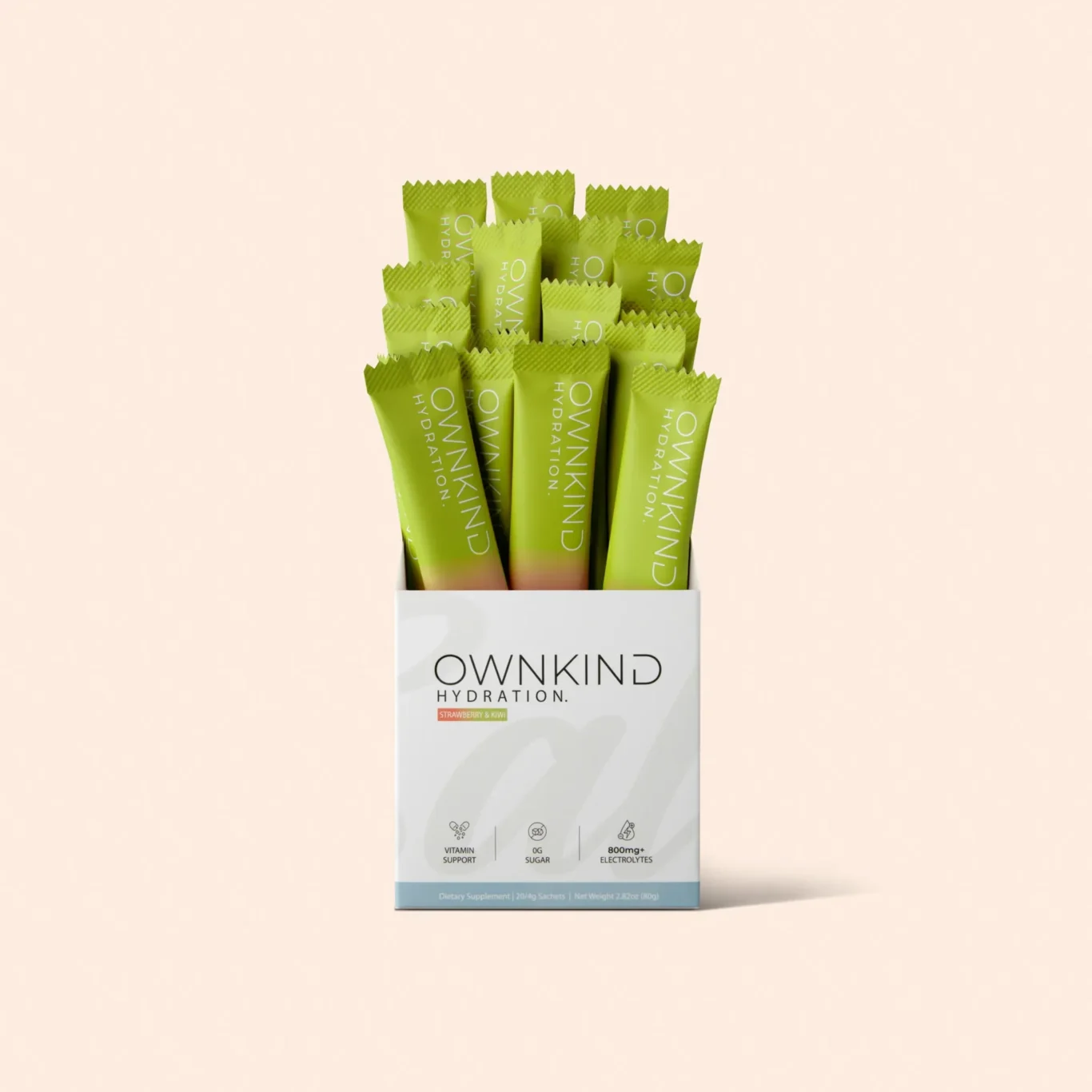 Box of OWNKIND Hydration dietary supplement with many bright green sachets arranged inside a white display box
