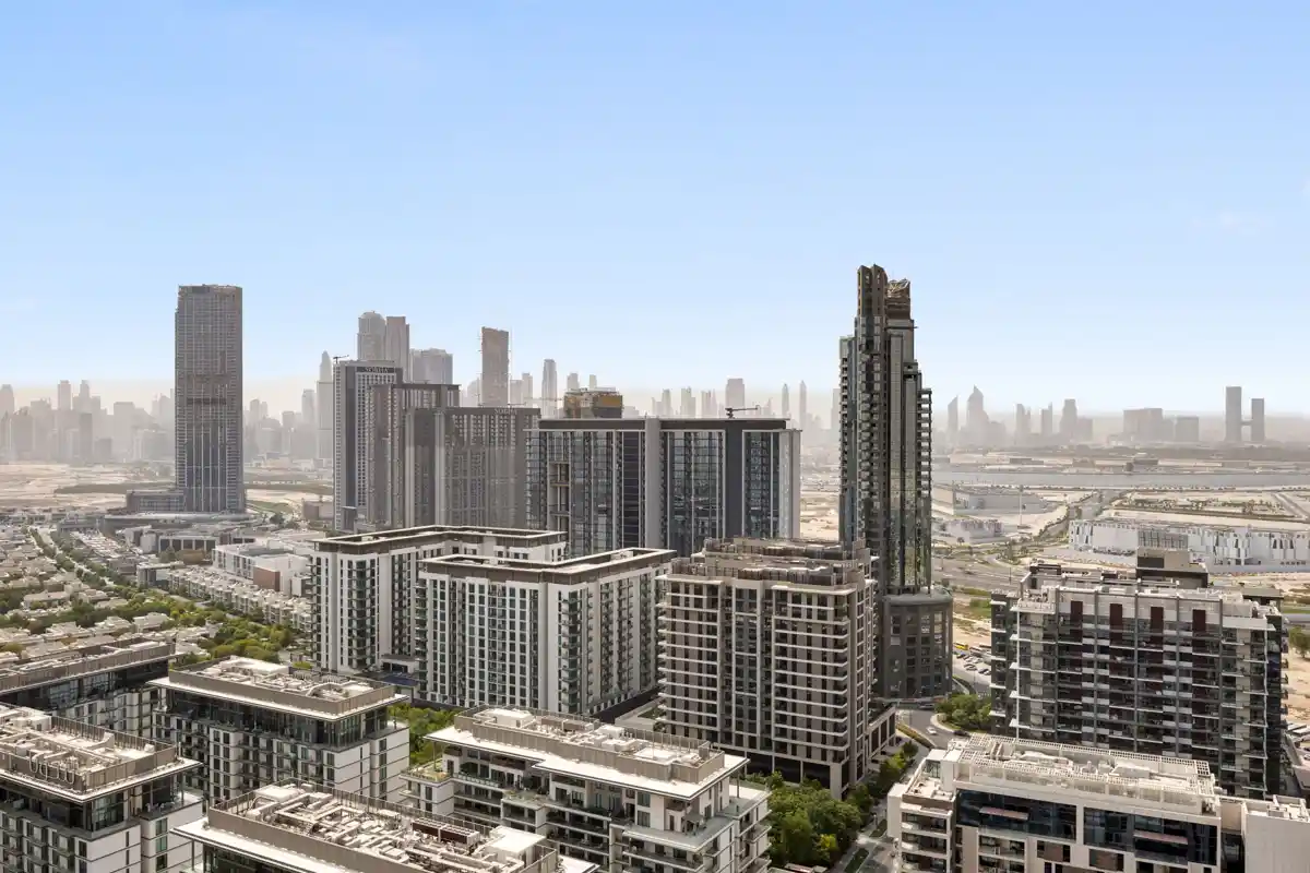 Balcony with seating and Downtown Dubai skyline, Airbnb at Crest Grande, Sobha Hartland, daylight