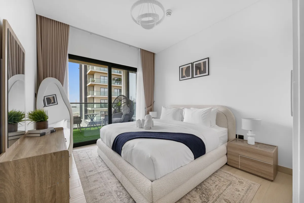 King bedroom of a 3-bedroom Airbnb at Crest Grande, Sobha Hartland, daylight