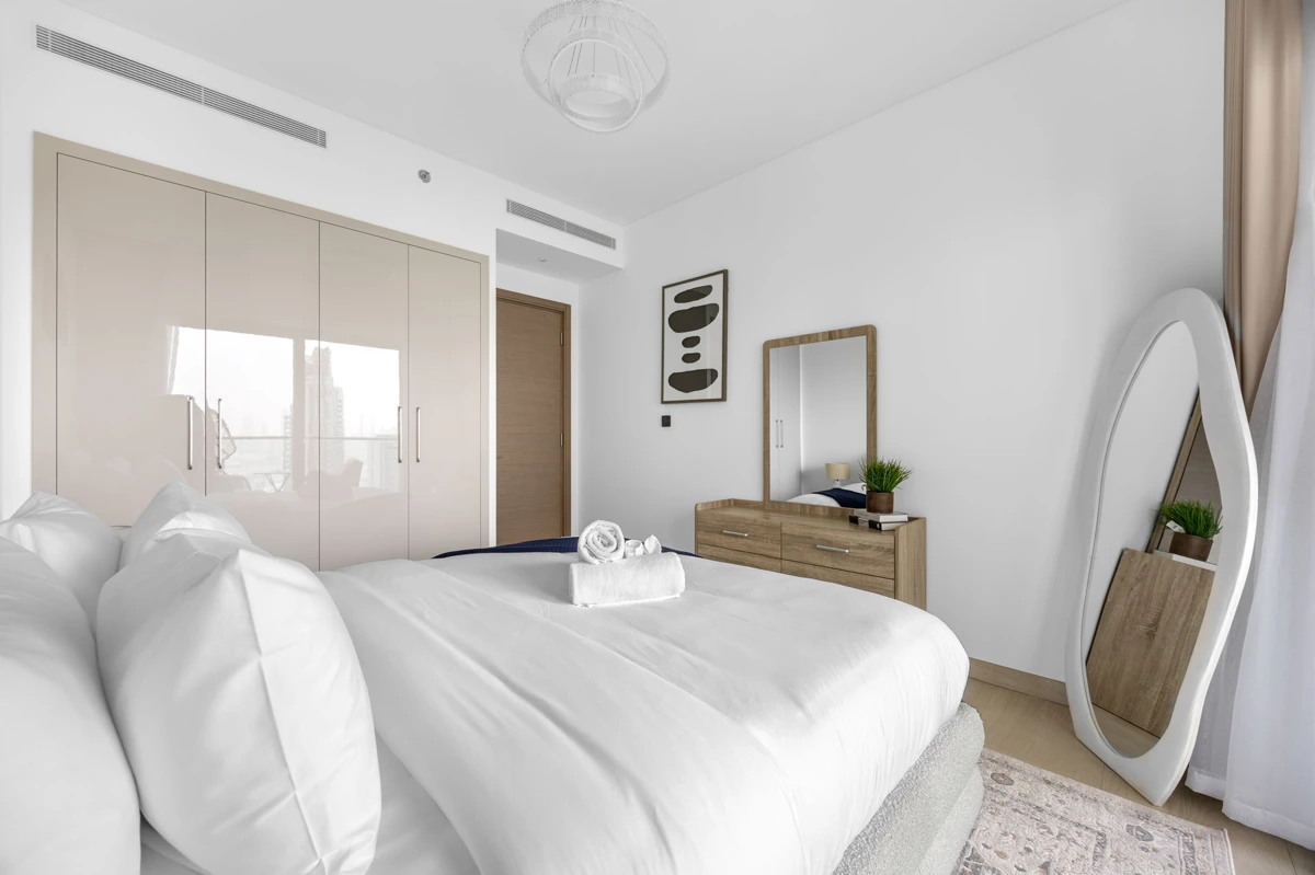 King bedroom of a 3-bedroom Airbnb at Crest Grande, Sobha Hartland, daylight