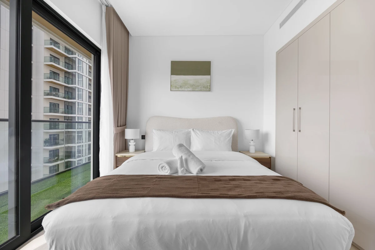 Queen bedroom with dresser and Downtown view, Airbnb at Crest Grande, Sobha Hartland, daylight
