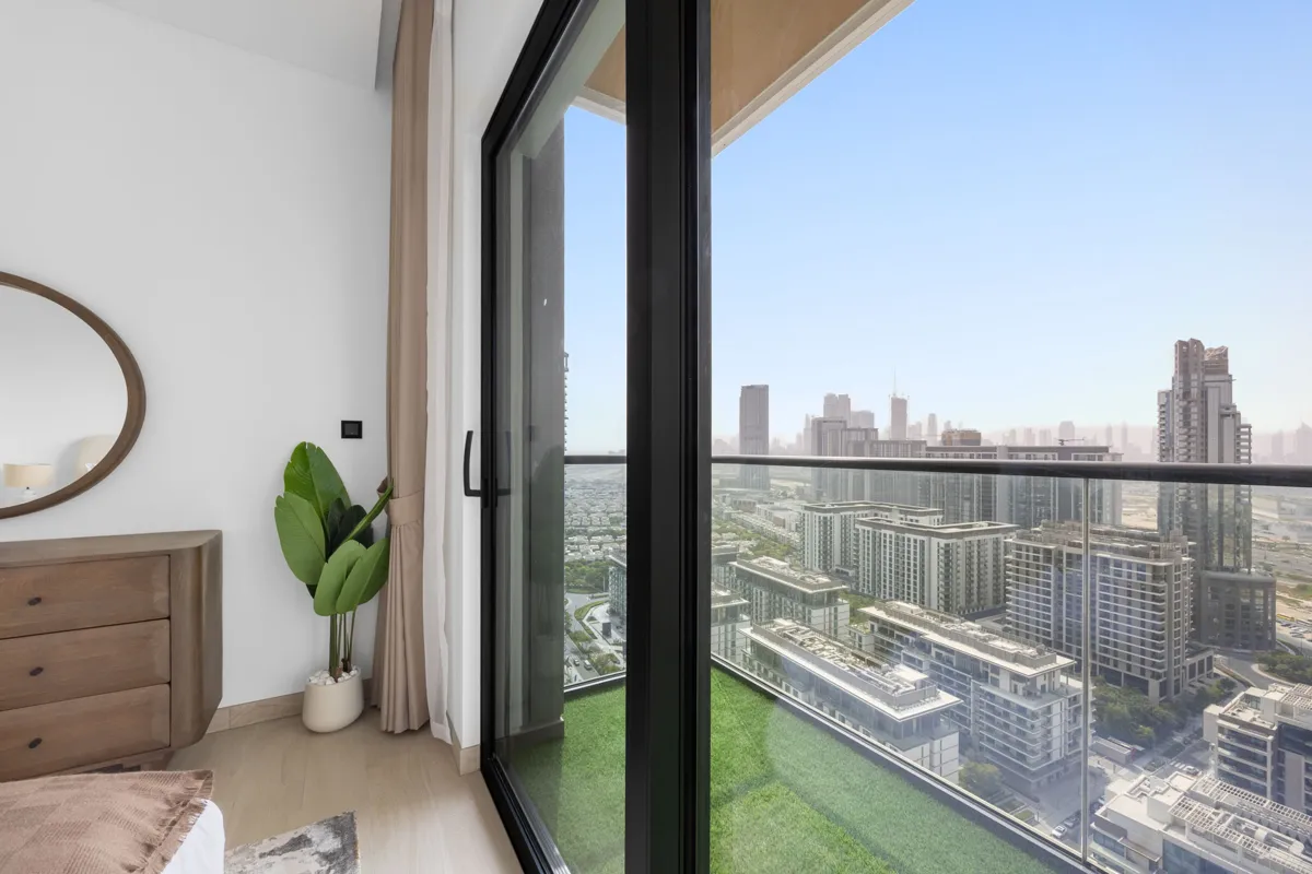 Queen bedroom with dresser and Downtown view, Airbnb at Crest Grande, Sobha Hartland, daylight