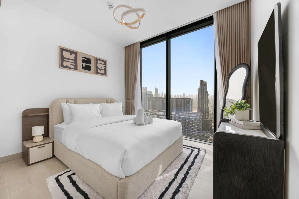 Third bedroom with queen bed and wardrobe, Airbnb at Crest Grande, Sobha Hartland, daylight