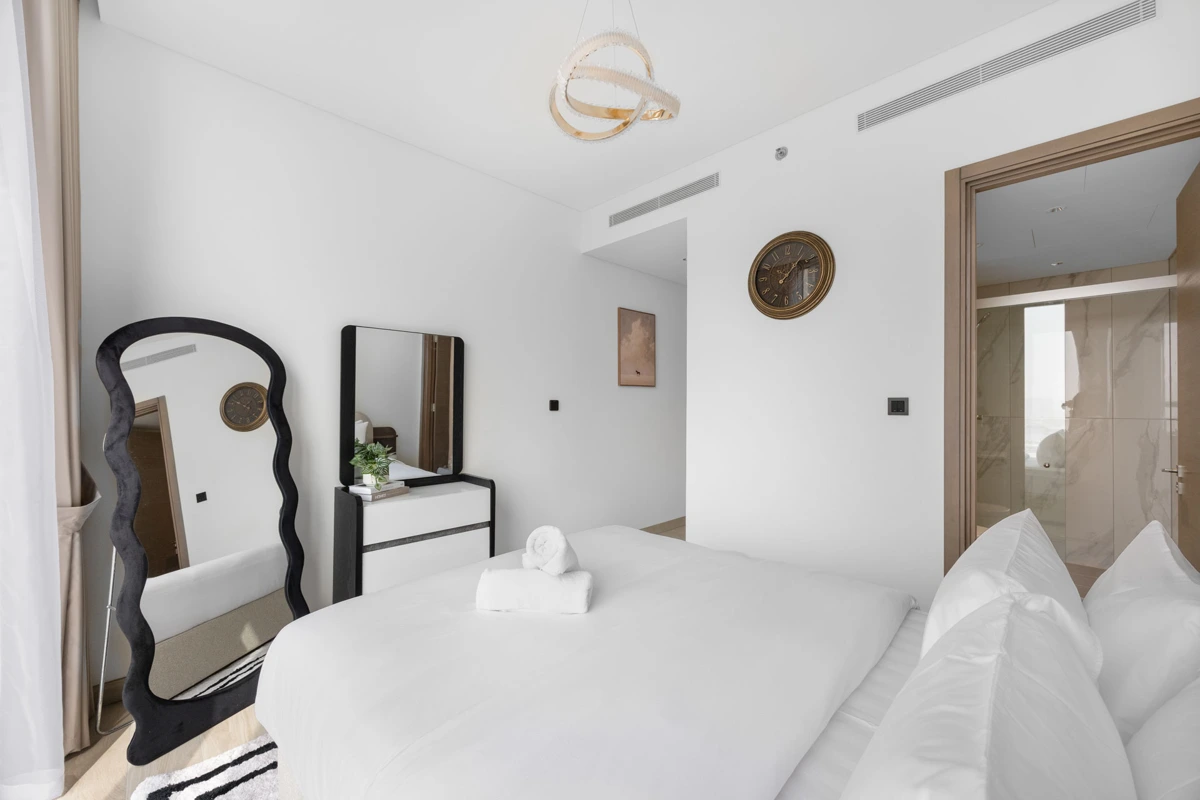 Third bedroom with queen bed and wardrobe, Airbnb at Crest Grande, Sobha Hartland, daylight