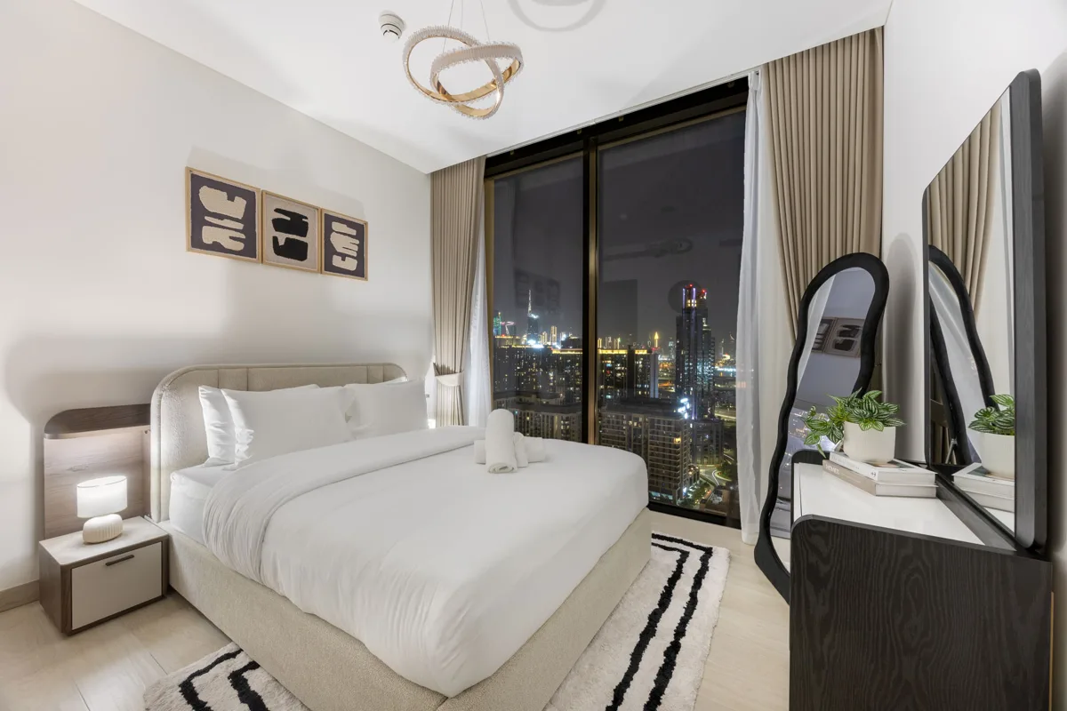 Third bedroom at night and the Downtown view, Airbnb at Crest Grande, Sobha Hartland