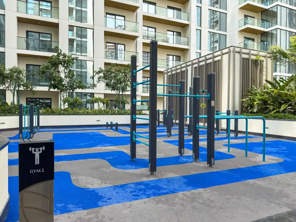 Podium amenities at Crest Grande, Sobha Hartland: outdoor gym, kids playground and lawn, Airbnb photography