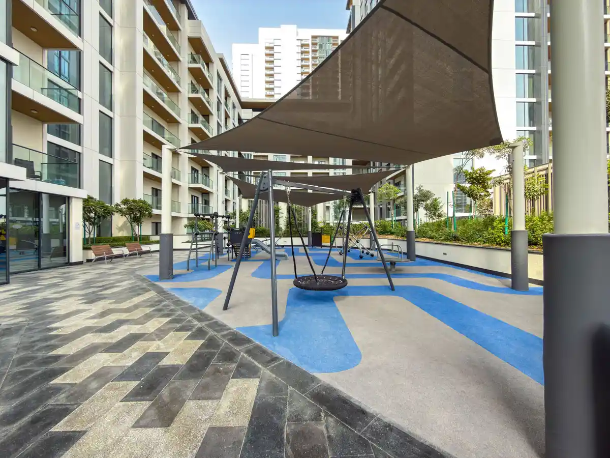 Podium amenities at Crest Grande, Sobha Hartland: outdoor gym, kids playground and lawn, Airbnb photography