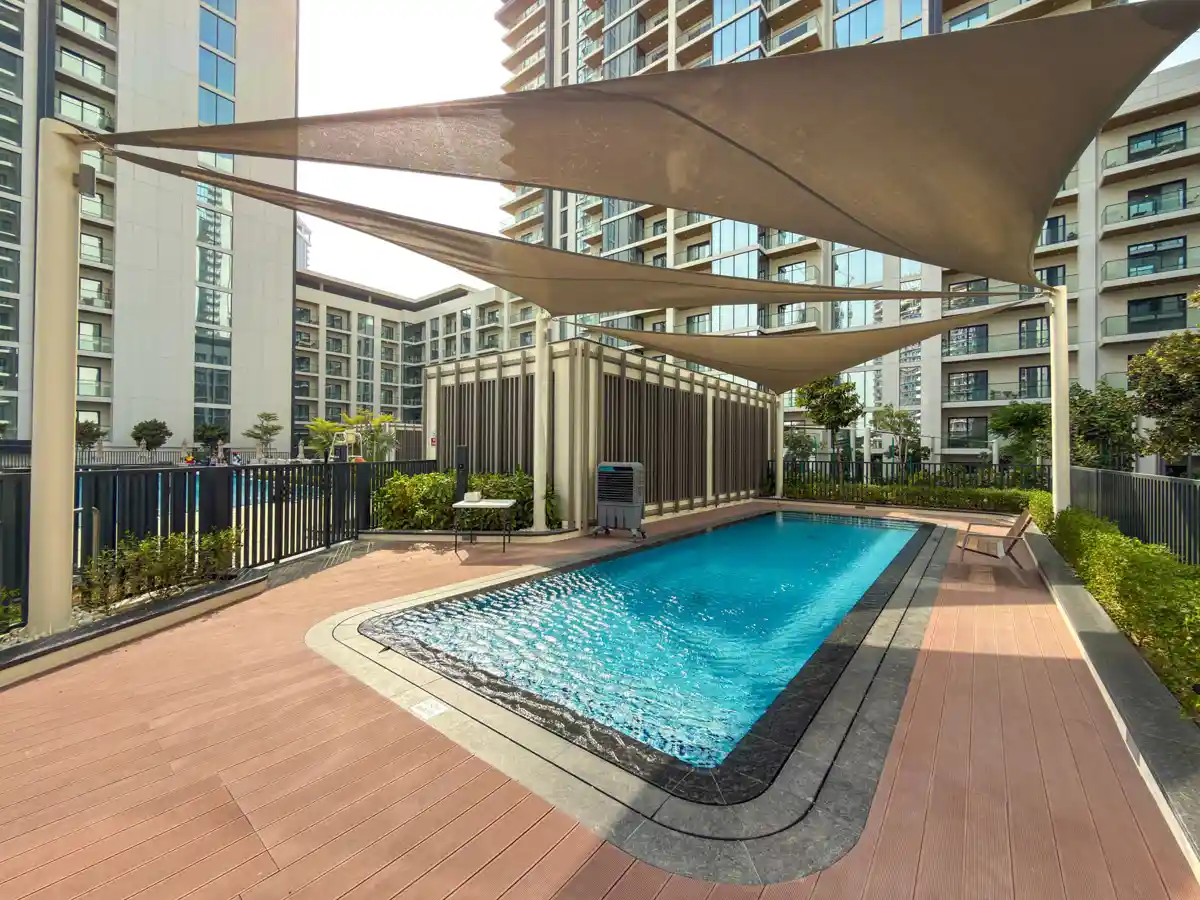 Podium amenities at Crest Grande, Sobha Hartland: outdoor gym, kids playground and lawn, Airbnb photography