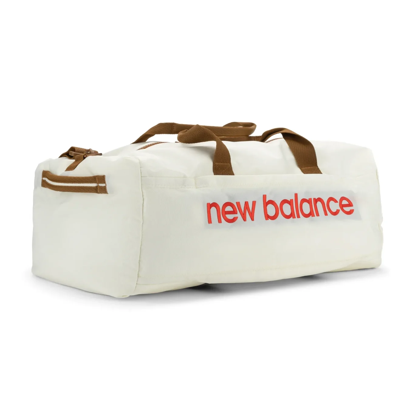 White New Balance duffel bag at a three-quarter angle on white. E-commerce product photography for New Balance by MRPS in Dubai.