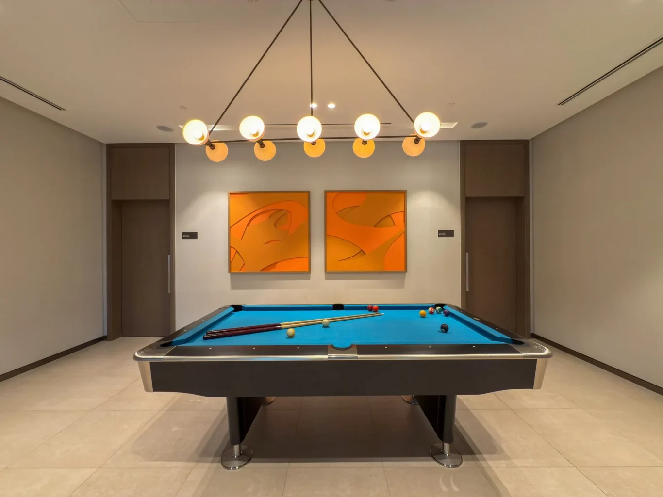 Games room pool table at Grande Signature, Downtown Dubai, photographed for StayComfy Holiday Homes.