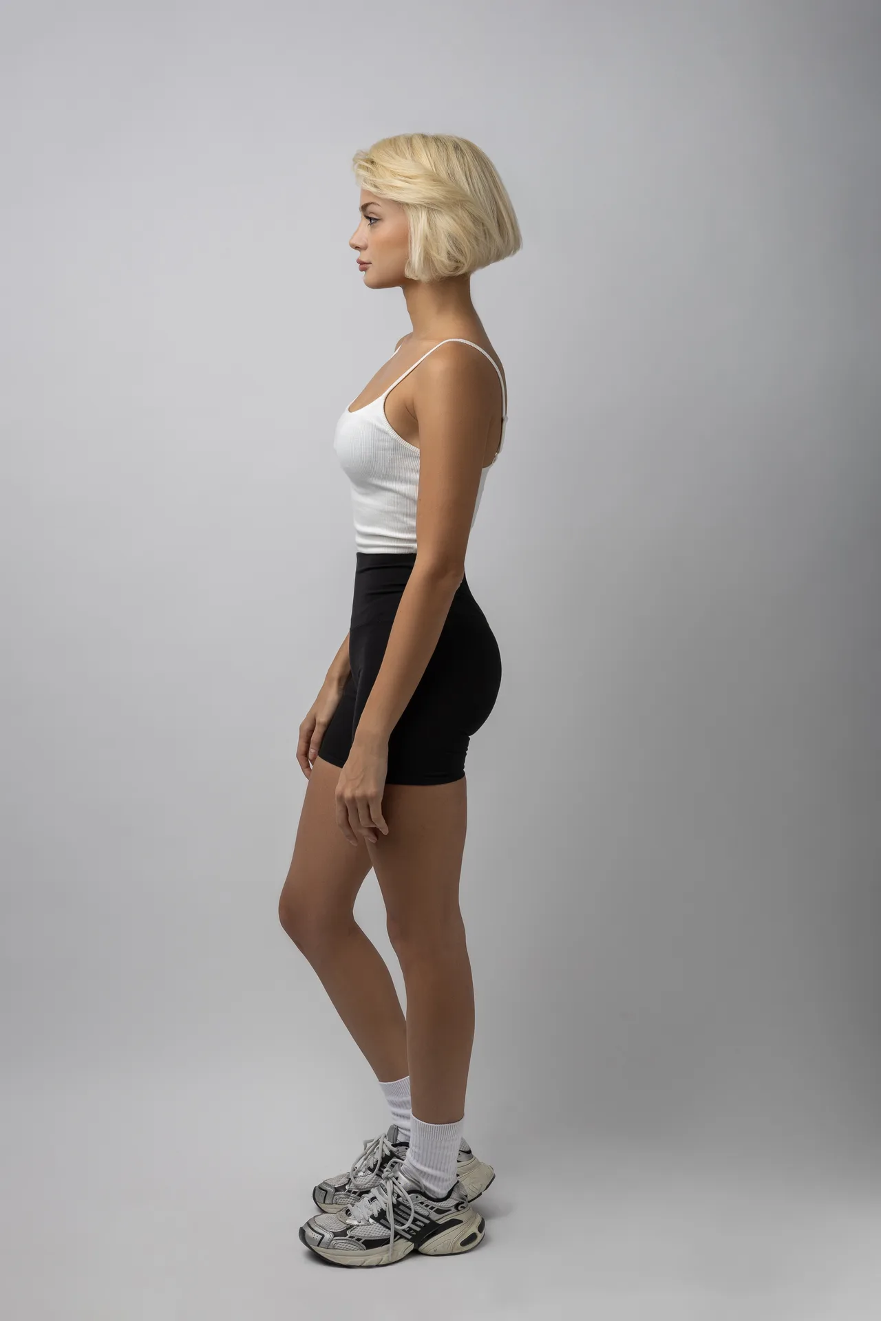 Side profile full-length digital of Dr. Aysan Soleymani for agency submissions.