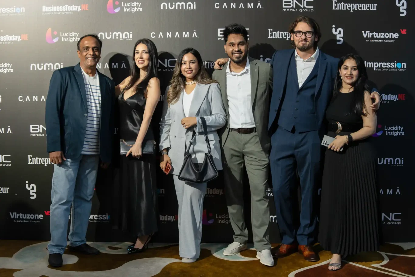 FundedNext team photo at the sponsors media wall before the ceremony. Event photography by MRPS for FundedNext at the Tech Innovation Awards 2026, Al Habtoor Palace, Dubai.