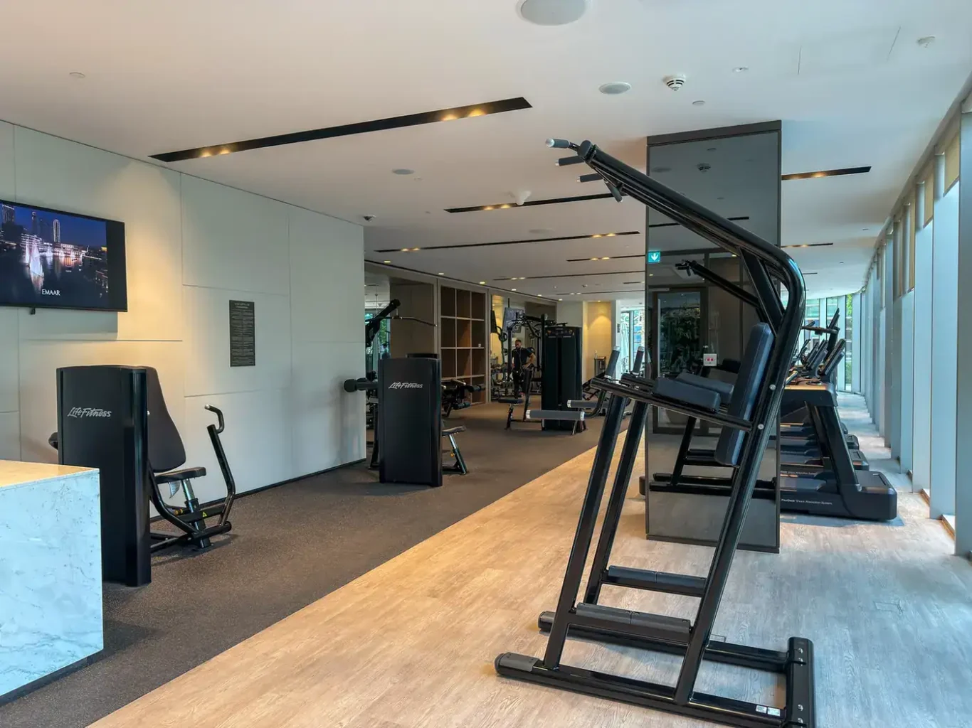 Residents' gym cardio machines at Grande Signature, Downtown Dubai, photographed for StayComfy Holiday Homes.