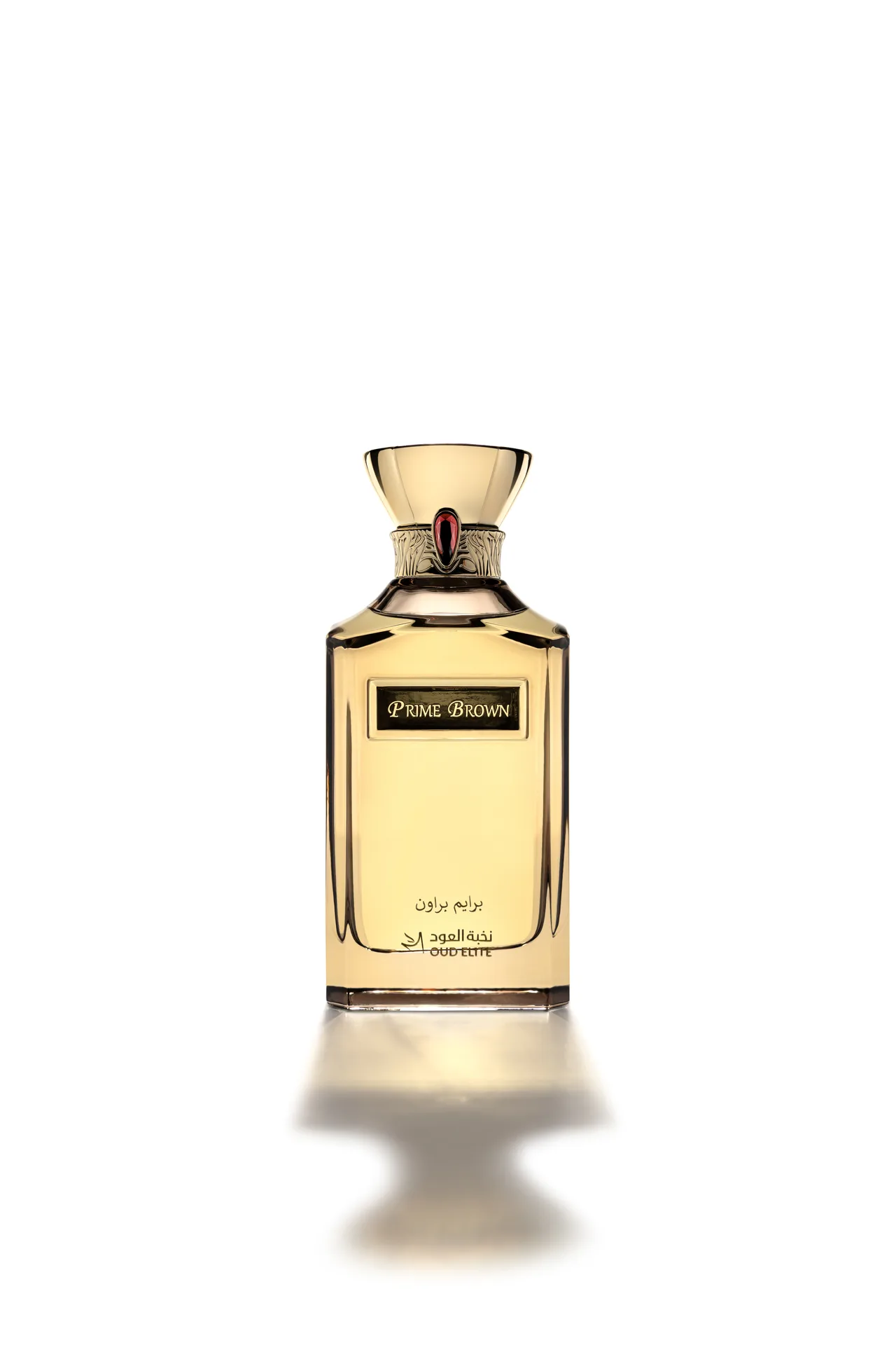 Oud Elite Prime Brown perfume in an amber glass bottle with a gold cap, photographed front-on against white.