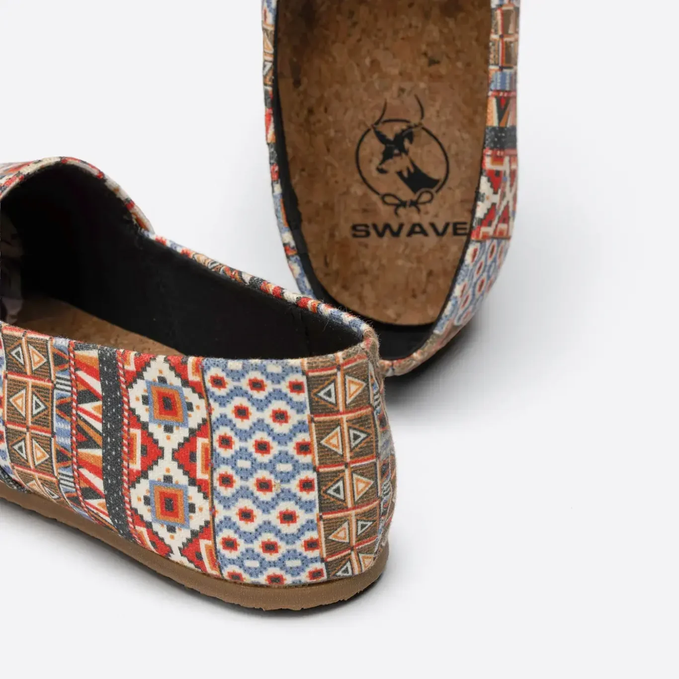 Cork insole with the SWAVE logo on a red pattern shoe. E-commerce shoe photography for SWAVE by MRPS in Dubai.