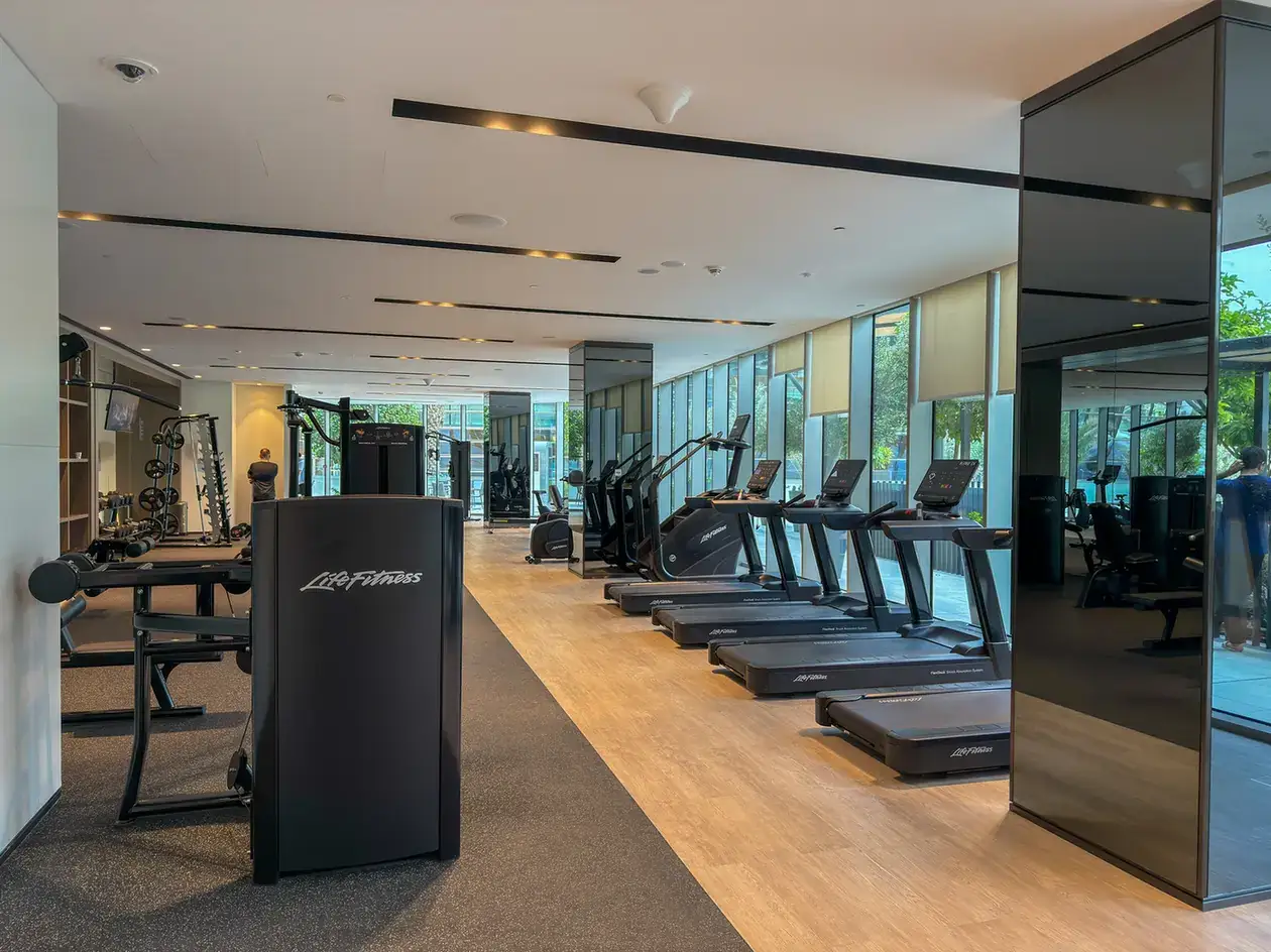 Gym strength training equipment at Grande Signature, Downtown Dubai, photographed for StayComfy Holiday Homes.