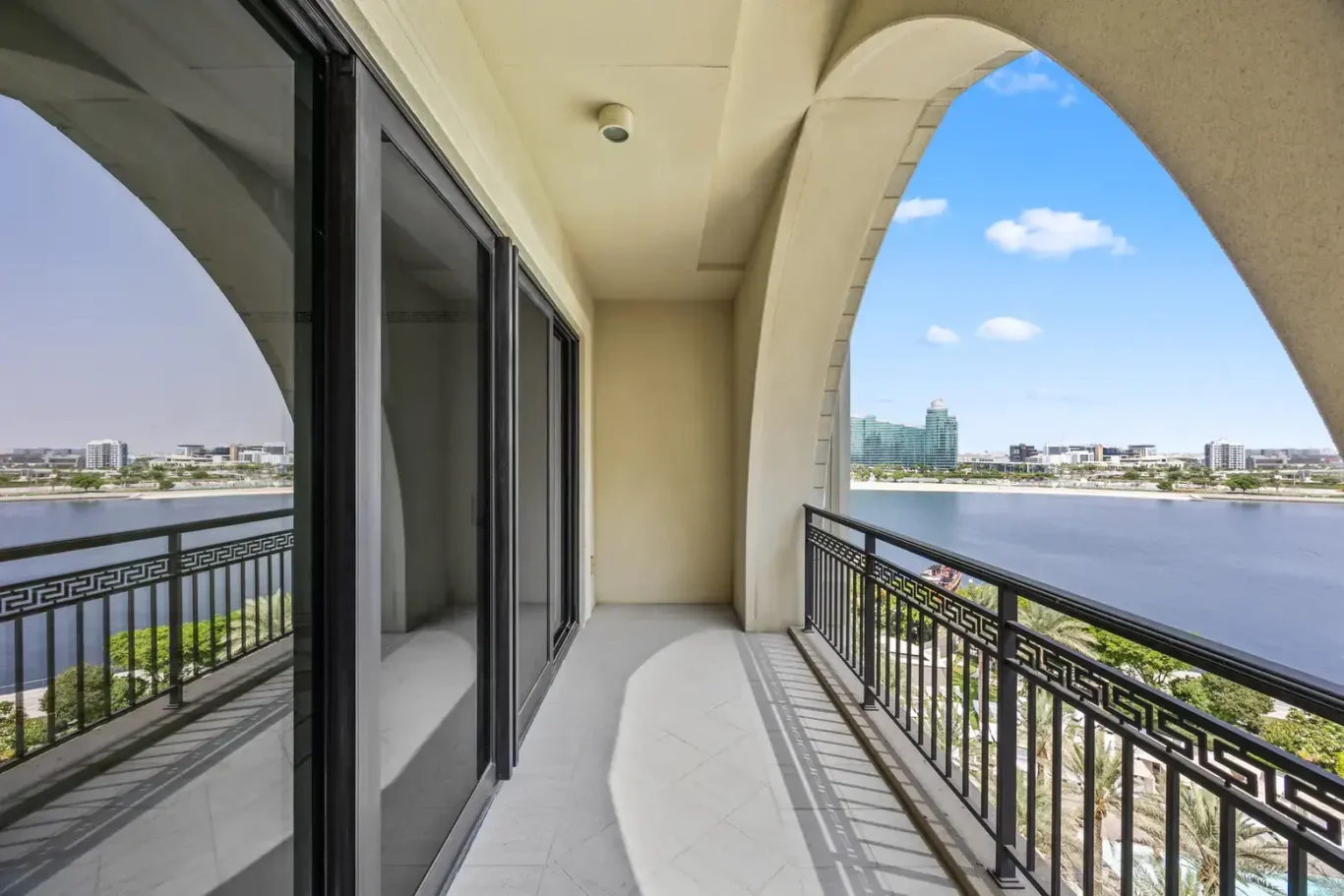 Arched balcony overlooking Dubai Creek in a three-bedroom residence at Palazzo Versace Dubai, Jaddaf Waterfront, photographed for Concierge Auctions.