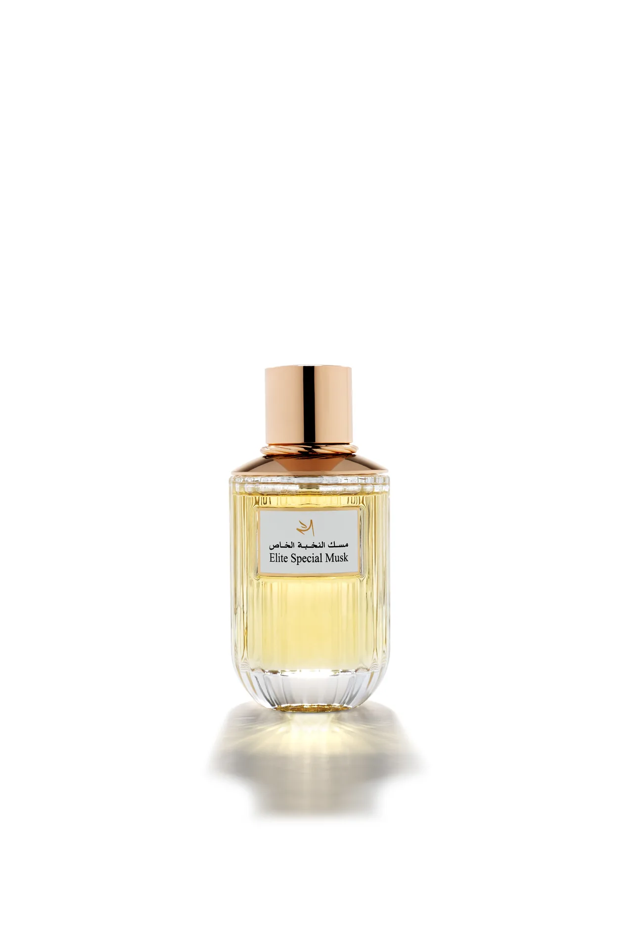 Oud Elite Special Musk perfume in a ribbed glass bottle with a rose gold cap, photographed front-on against white.