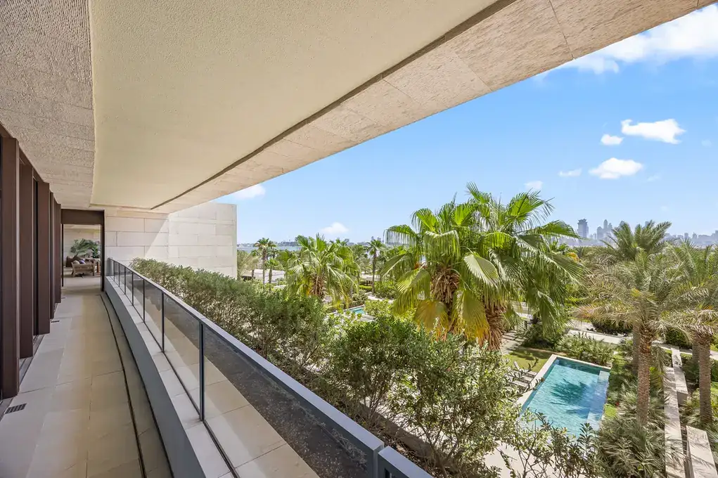Terrace edge overlooking the palm gardens in a furnished three-bedroom residence at Atlantis The Royal, Palm Jumeirah, photographed for Apex Homes Real Estate.