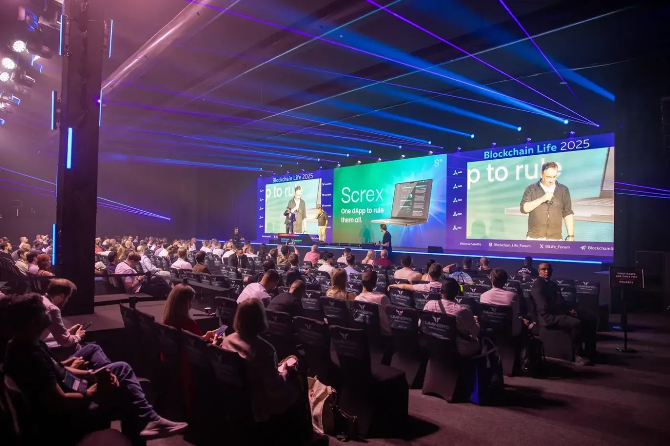 Wide view of the main hall audience during a keynote. Event photography by MRPS at Blockchain Life 2025, Festival Arena, Dubai.