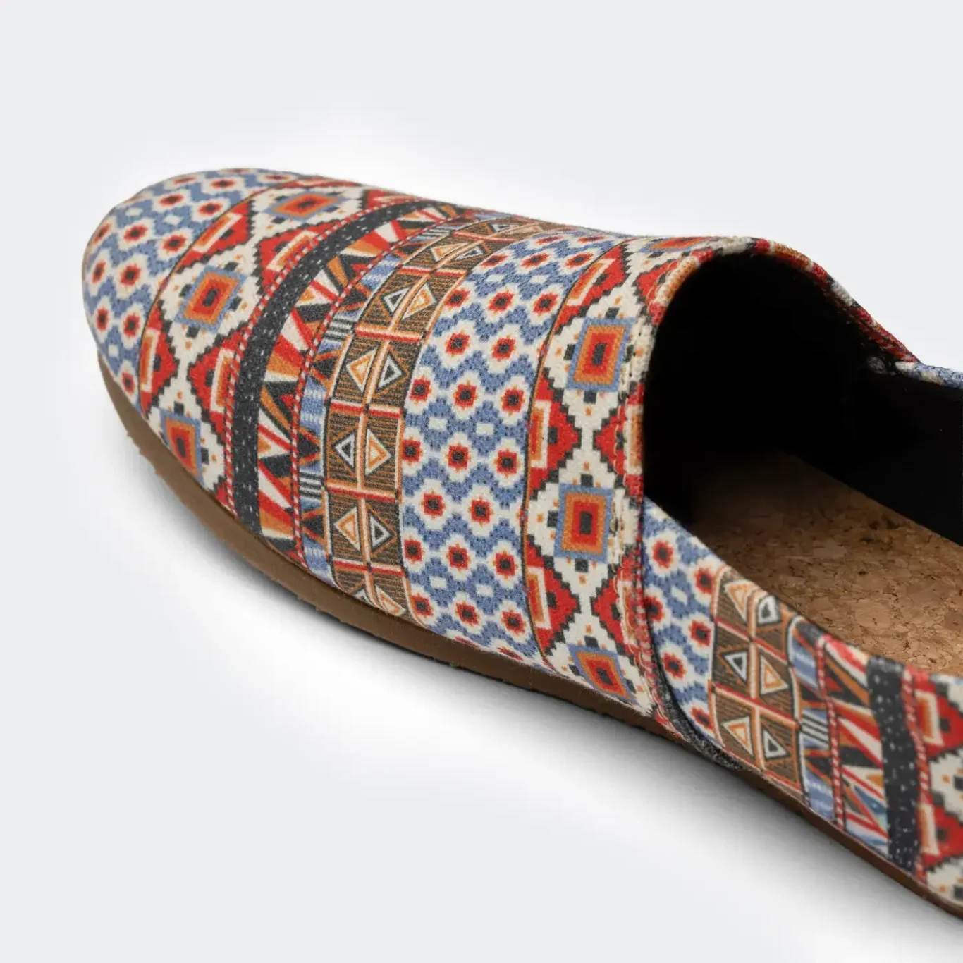 Close-up of the woven red and blue toe pattern. E-commerce shoe photography for SWAVE by MRPS in Dubai.