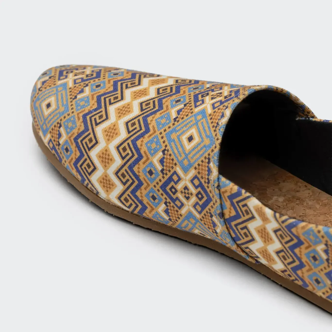 Close-up of the sand and blue woven toe pattern. E-commerce shoe photography for SWAVE by MRPS in Dubai.