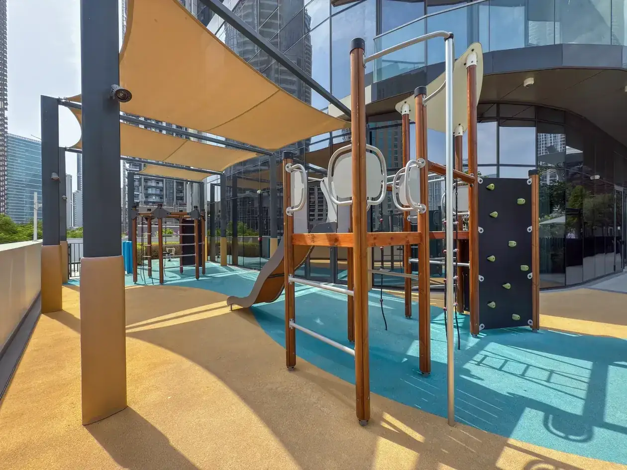 Outdoor children's playground at Grande Signature, Downtown Dubai, photographed for StayComfy Holiday Homes.
