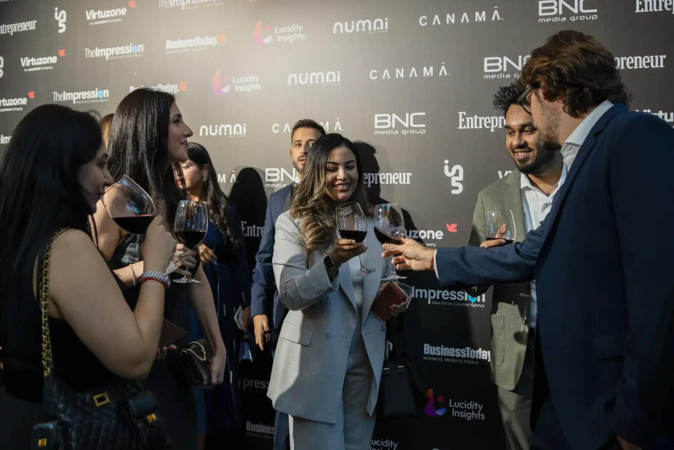 Guests networking at the welcome reception. Event photography by MRPS for FundedNext at the Tech Innovation Awards 2026, Al Habtoor Palace, Dubai.