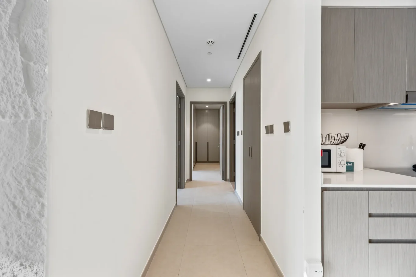 Hallway leading to the bedrooms. Airbnb photography by MRPS for Solea Stay in Dubai.