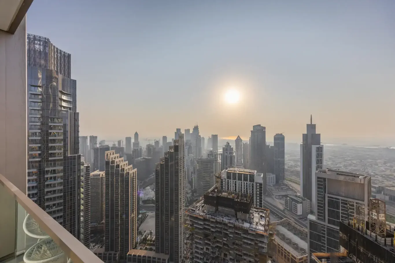 Sunlit skyline view from the high floor balcony. Airbnb photography by MRPS for Solea Stay in Dubai.
