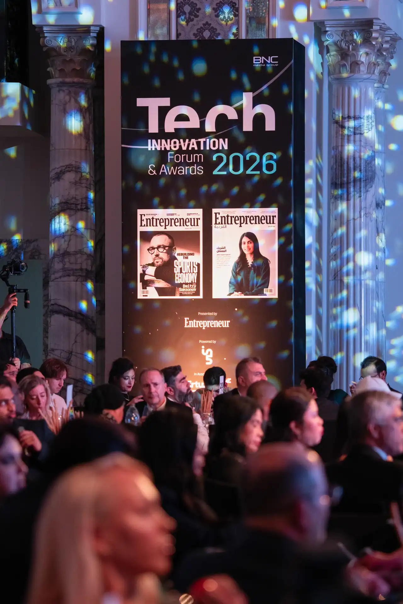 Audience seated beside the event banner in the ballroom. Event photography by MRPS for FundedNext at the Tech Innovation Awards 2026, Al Habtoor Palace, Dubai.
