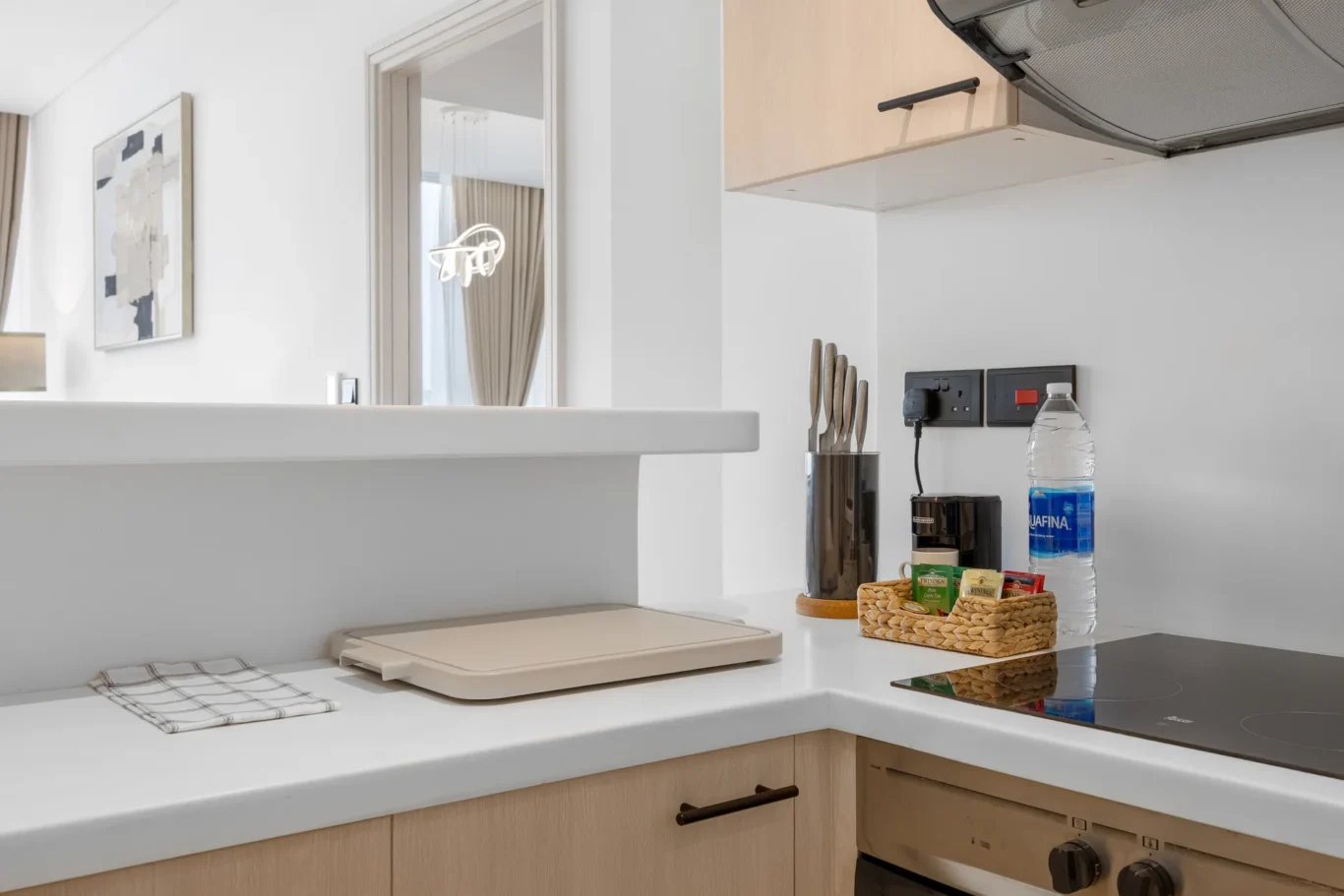 Kitchen hob and utensils in a Your Stay Apartments one-bedroom at Sky Gardens, DIFC, Dubai.
