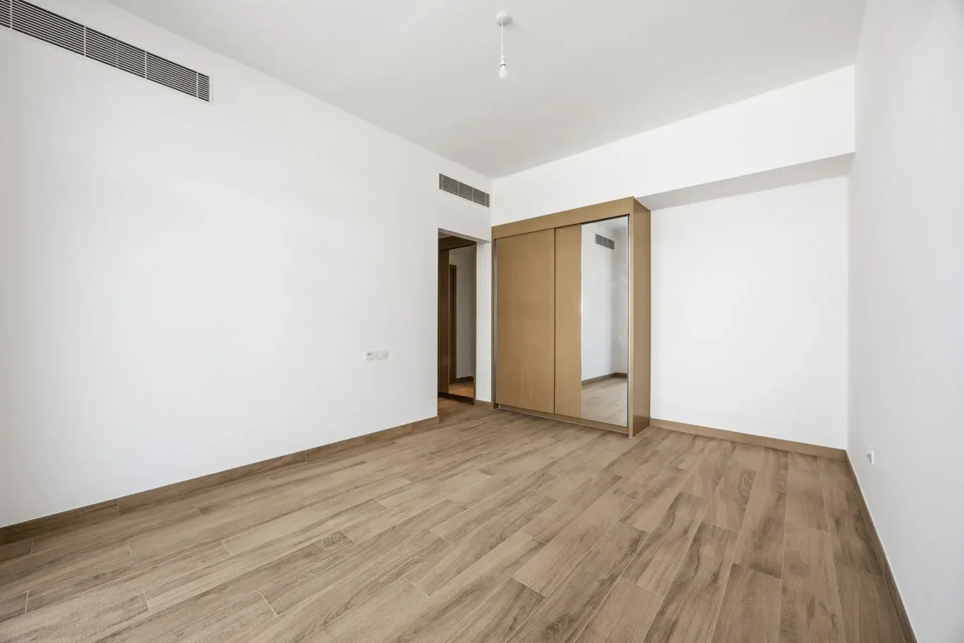 Wide view of the ground floor bedroom. Villa photography by MRPS in Dubai for ELITE Property Brokerage.