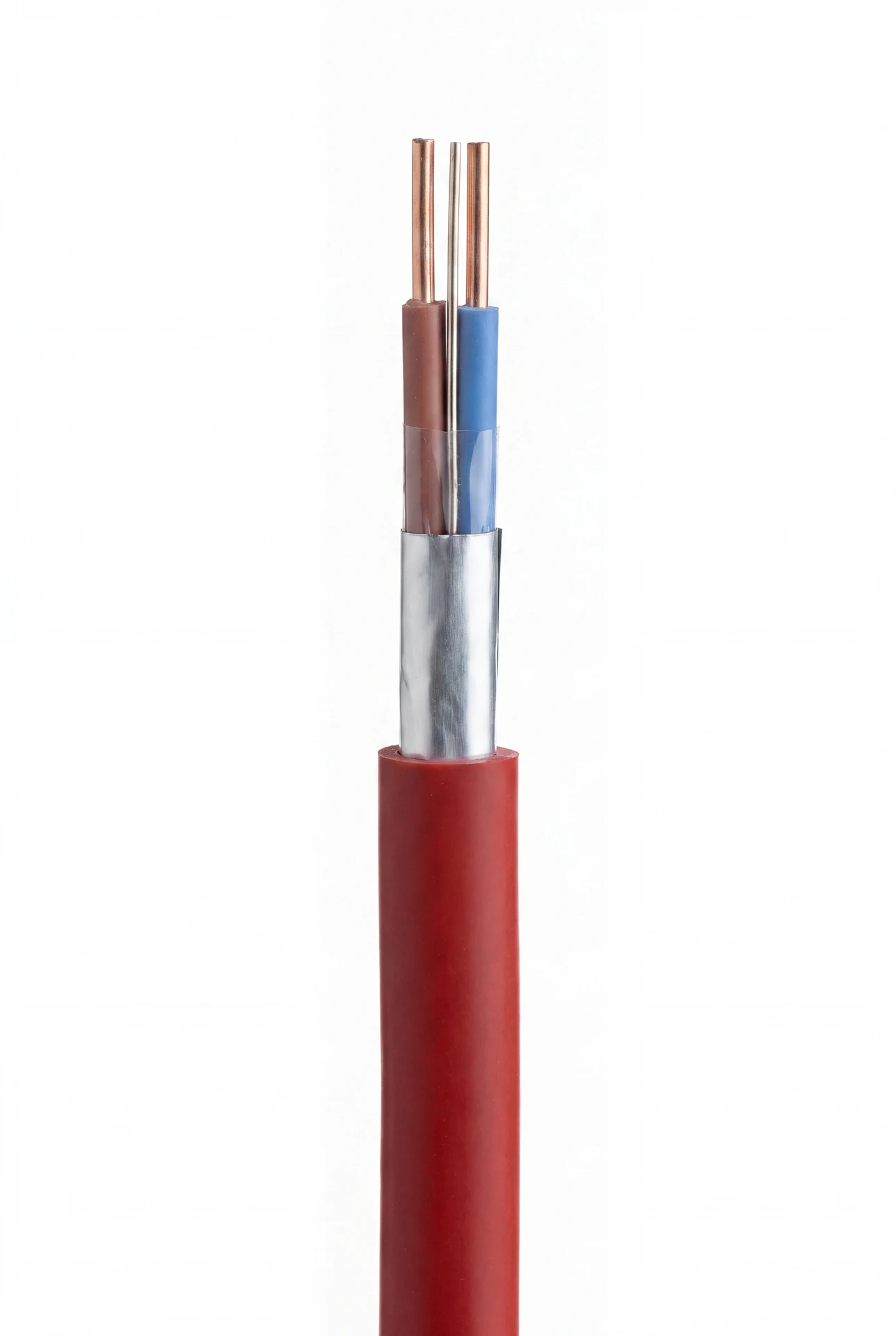 Macro studio photo of a red fire resistant cable showing copper conductors, insulation and foil screen.