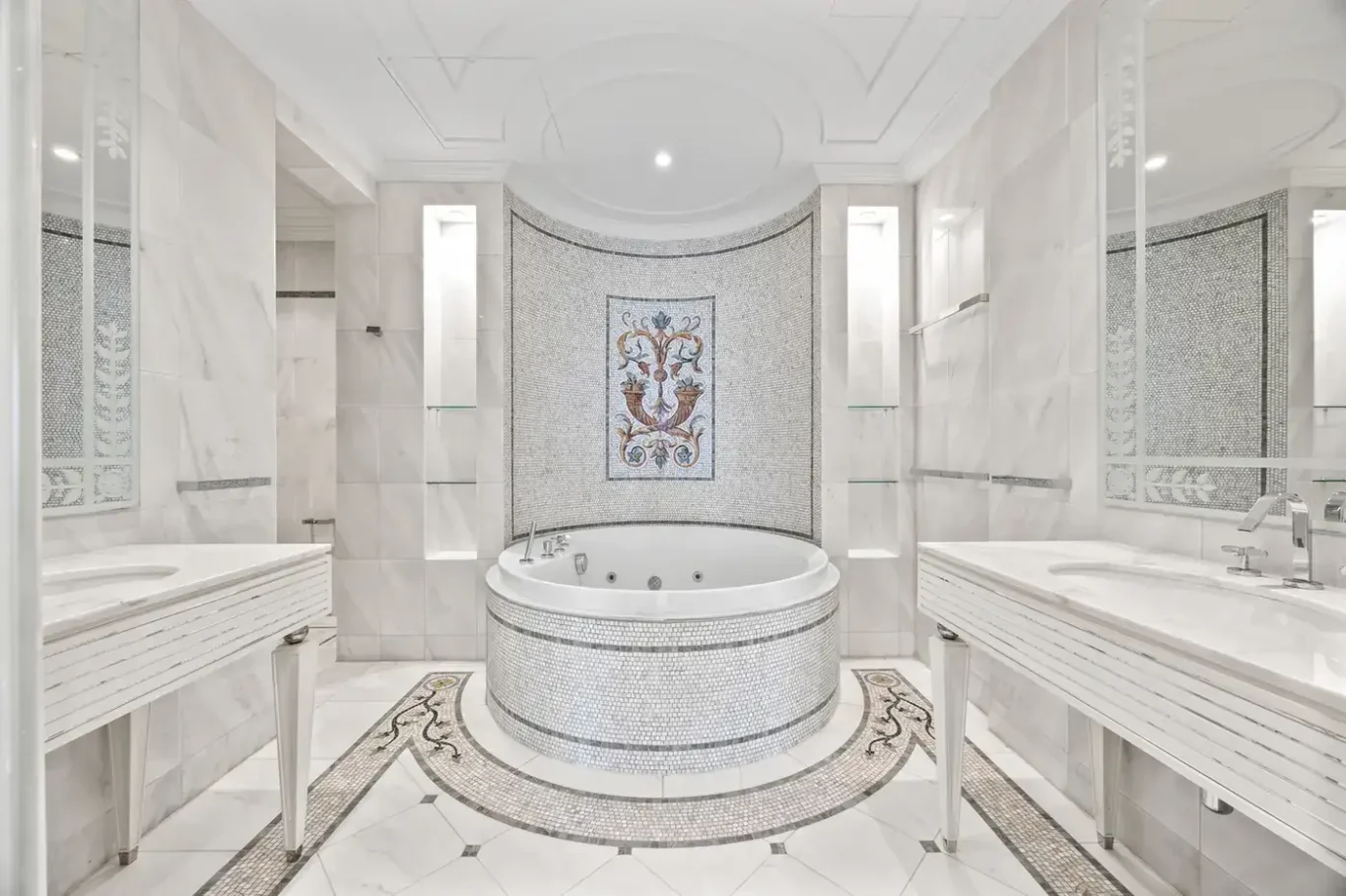 Master bathroom with a round jacuzzi bathtub and double vanity in a three-bedroom residence at Palazzo Versace Dubai, Jaddaf Waterfront, photographed for Concierge Auctions.