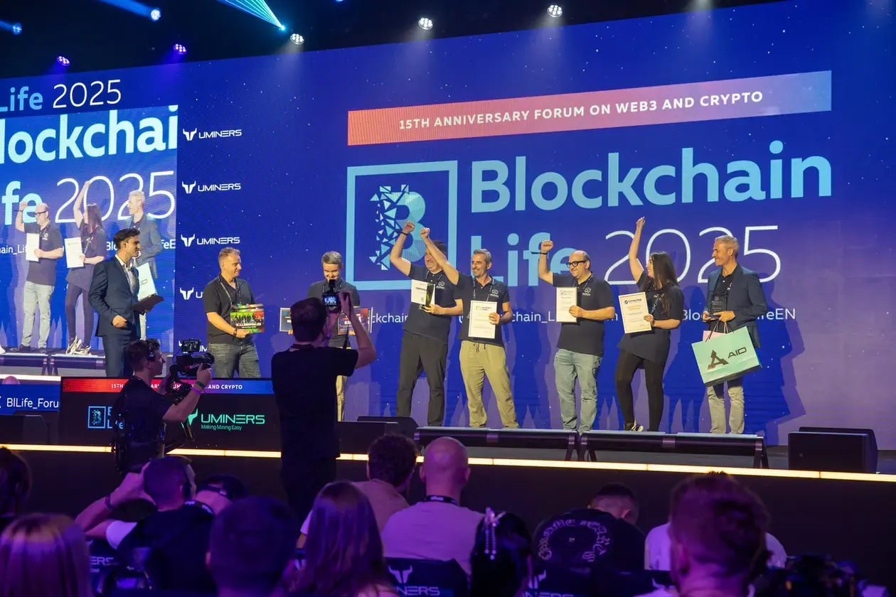 Award winners group photo on the Blockchain Life stage. Event photography by MRPS at Blockchain Life 2025, Festival Arena, Dubai.