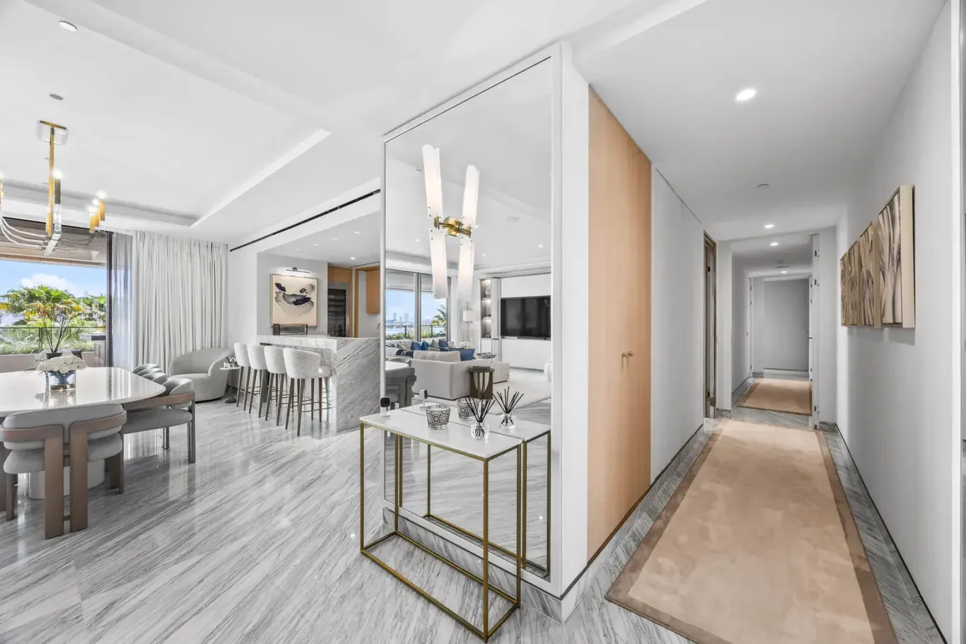Entrance and corridor to the bedrooms in a furnished three-bedroom residence at Atlantis The Royal, Palm Jumeirah, photographed for Apex Homes Real Estate.