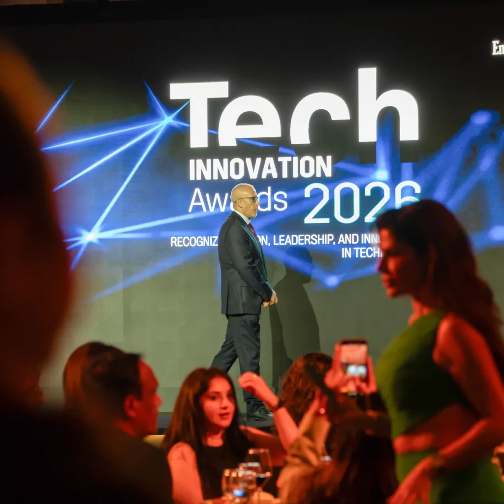 Presenter announcing the next award category. Event photography by MRPS for FundedNext at the Tech Innovation Awards 2026, Al Habtoor Palace, Dubai.
