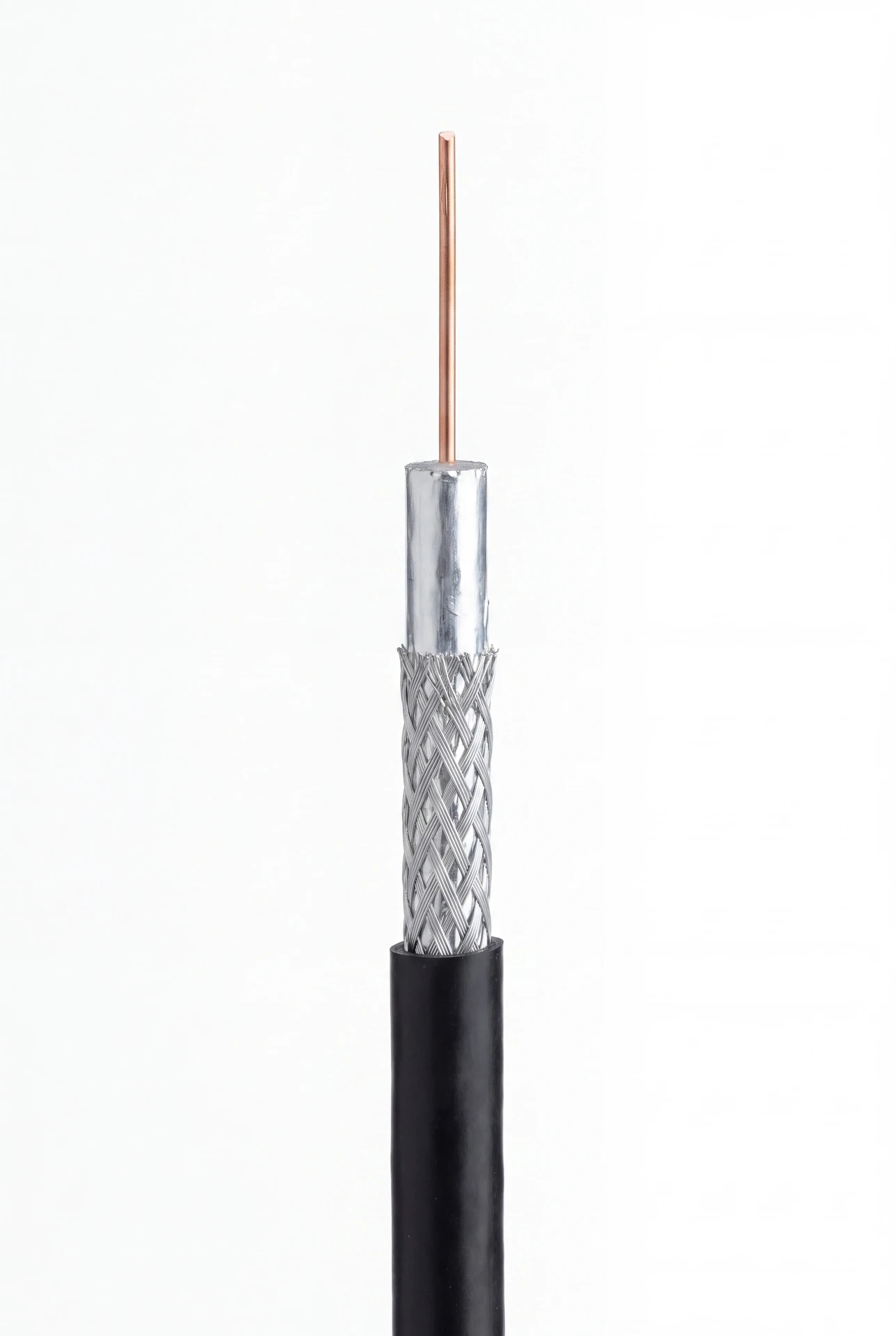 Macro studio photo of a black RG6 coaxial cable showing the braid, foil and copper centre conductor.