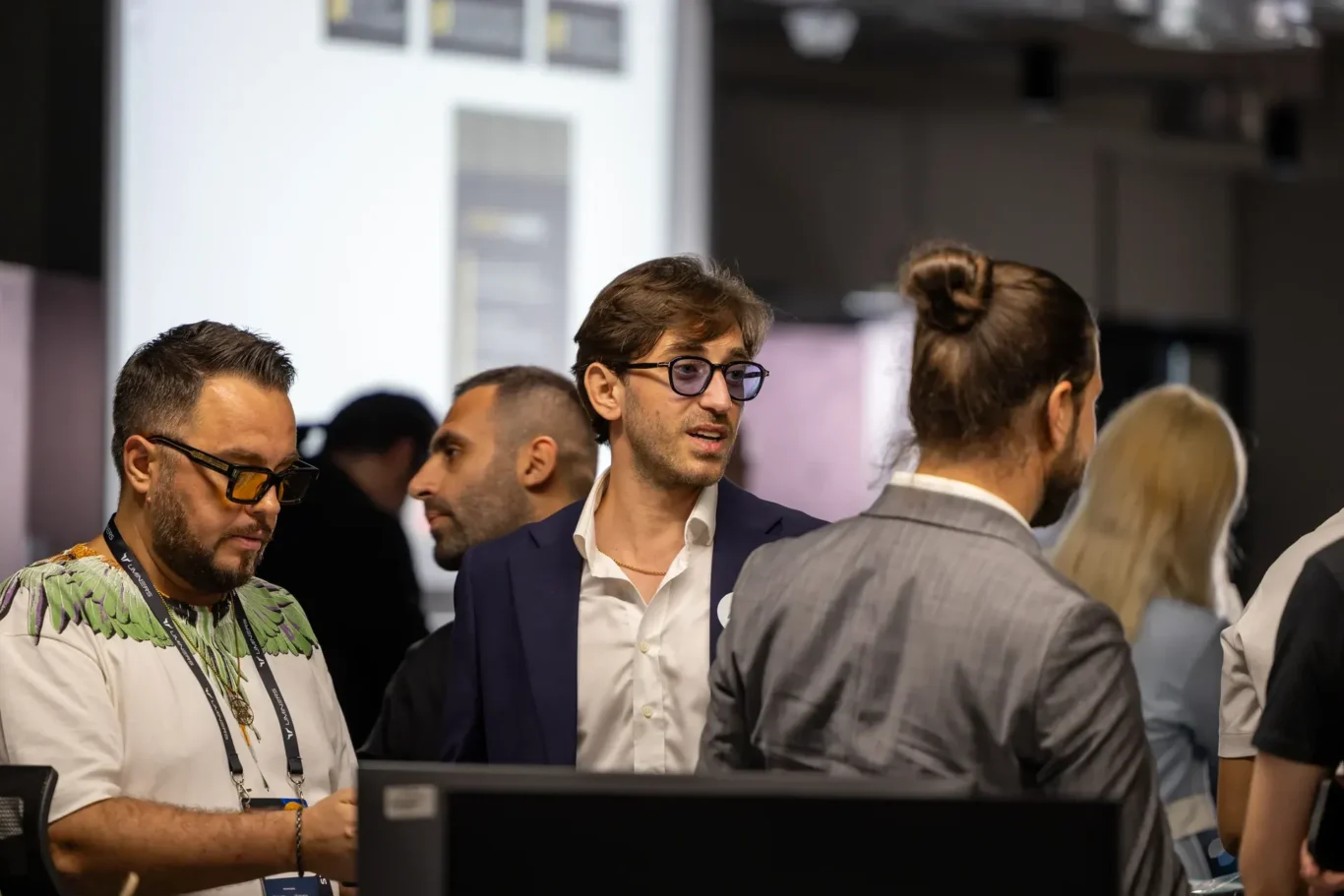 Attendees networking between sessions. Event photography by MRPS at Blockchain Life 2025, Festival Arena, Dubai.
