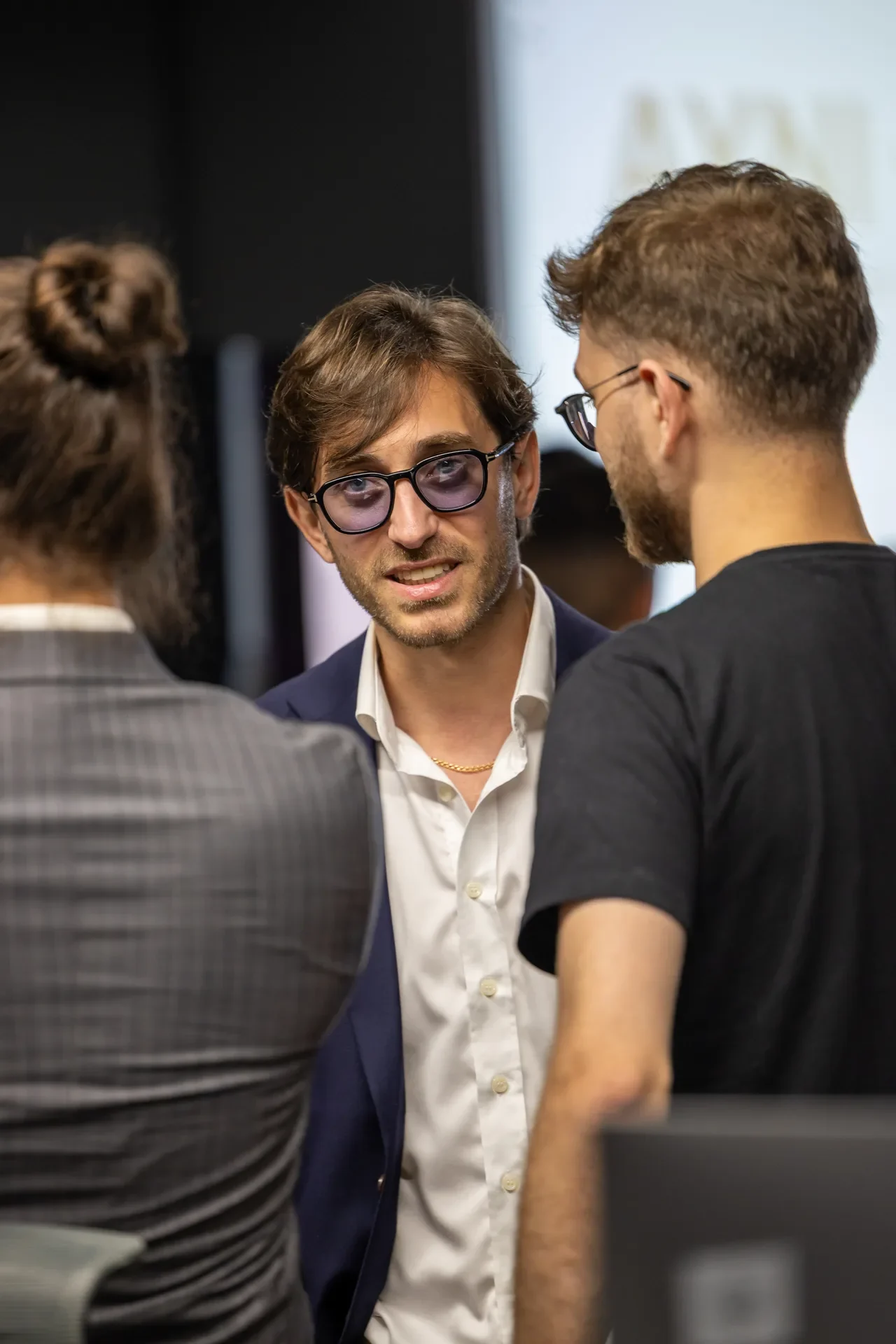Close networking moment between attendees. Event photography by MRPS at Blockchain Life 2025, Festival Arena, Dubai.