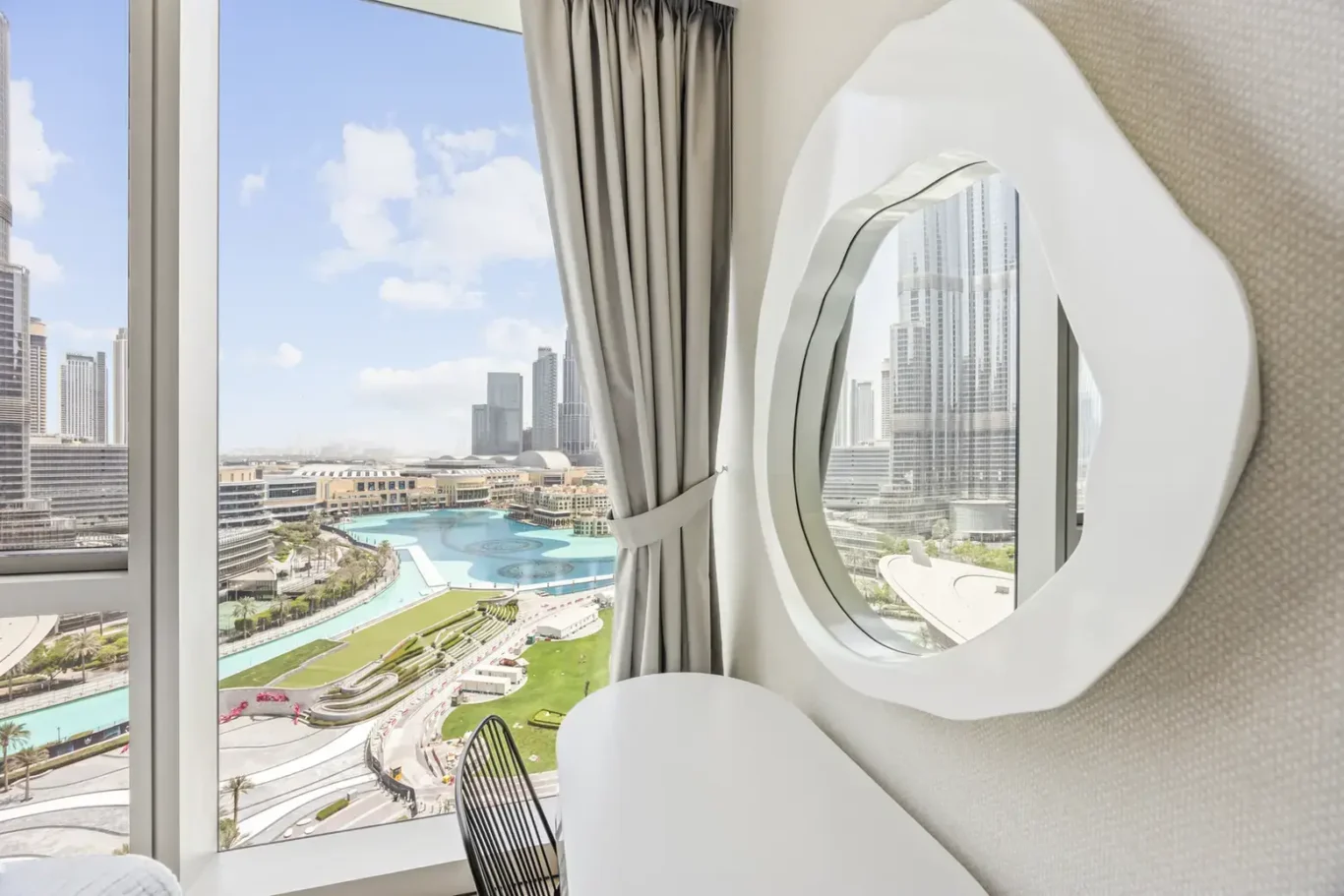 Burj Khalifa and Dubai Fountain view in a two-bedroom StayComfy Holiday Homes apartment at Grande Signature, Downtown Dubai.