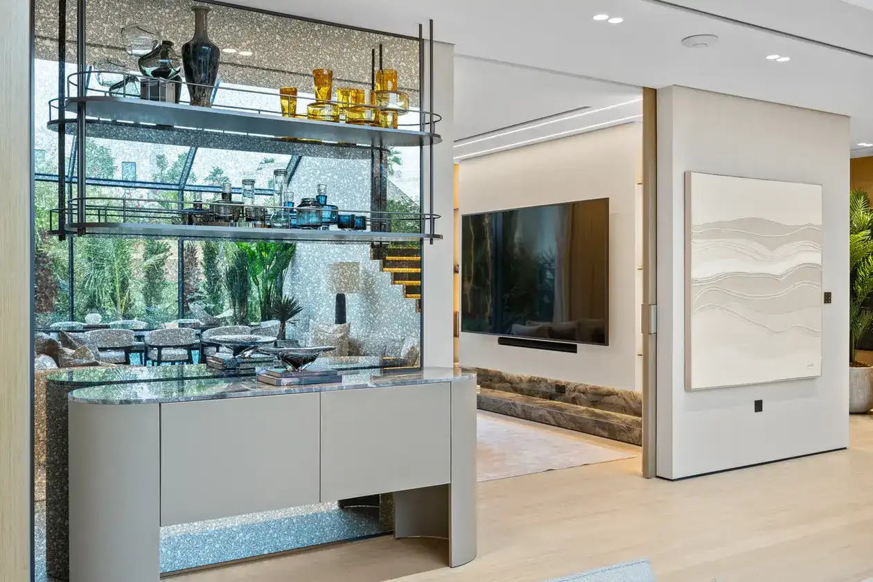 Glass display unit beside the TV lounge, luxury villa in Jumeirah Islands, Dubai.